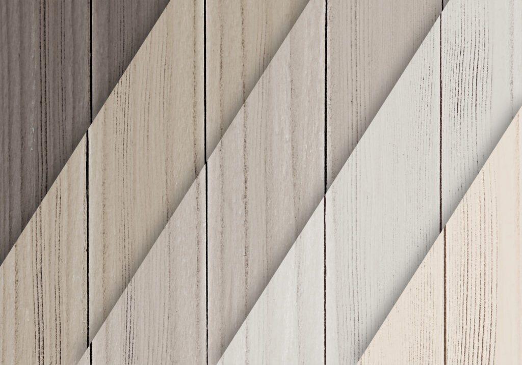 Sample display of luxury vinyl plank flooring in various wood shades for modern home design